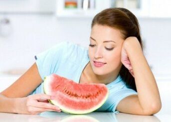 A girl follows a watermelon diet to fight obesity. 